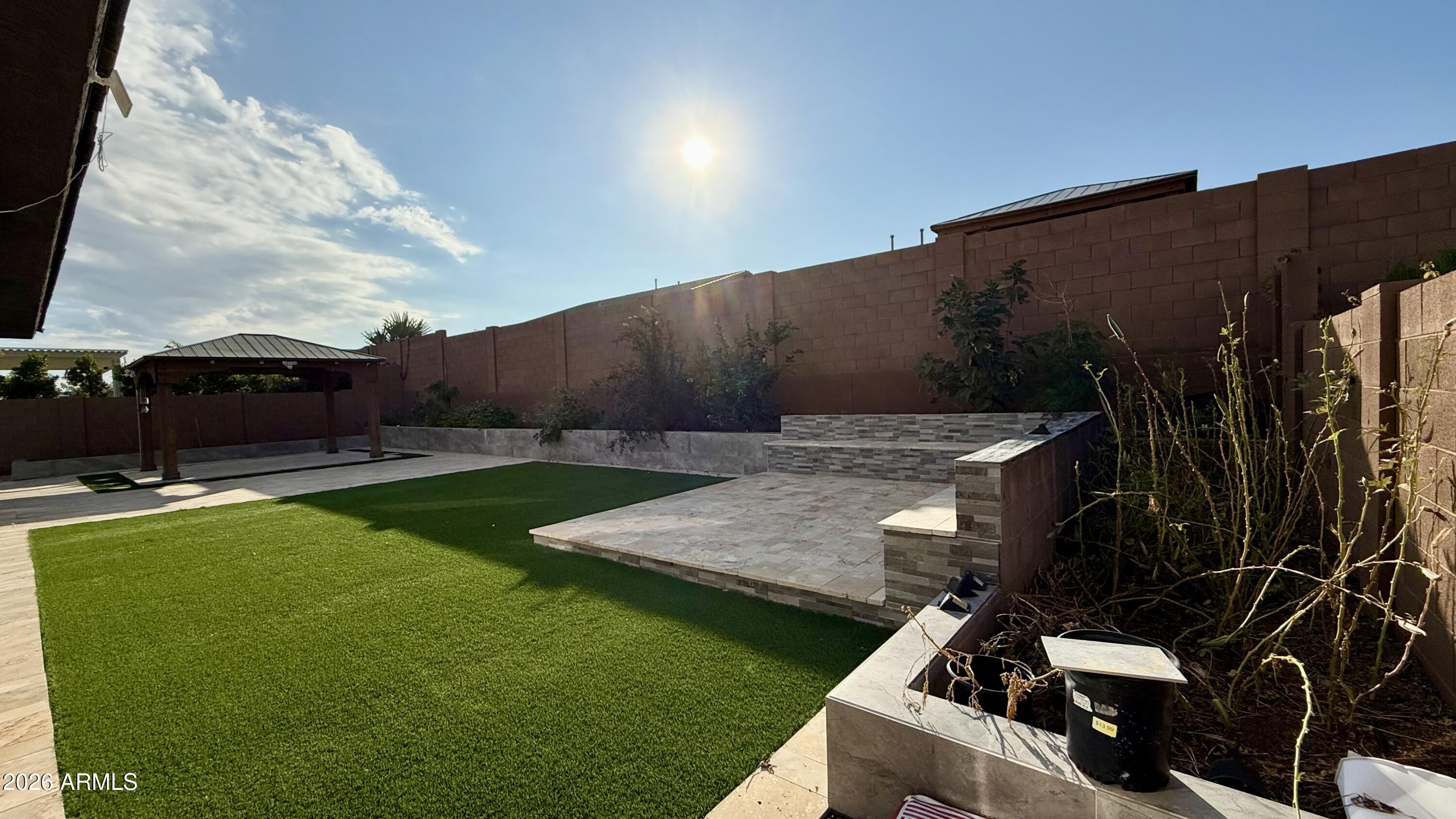 3355 East Constance Way Phoenix, AZ 85042 - Photo 34 of 42 a view of a backyard