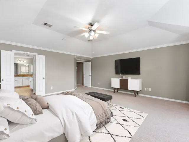 a kitchen with granite countertop wooden cabinets a sink and dishwasher