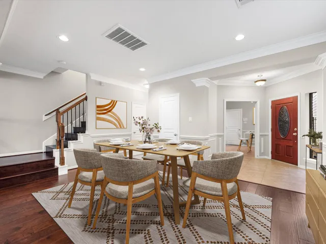 a view of a dining room with furniture