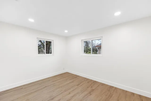 a bedroom with a bed and a view of bathroom