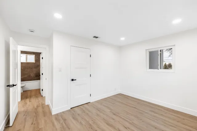 a bathroom with a toilet a sink and bathtub