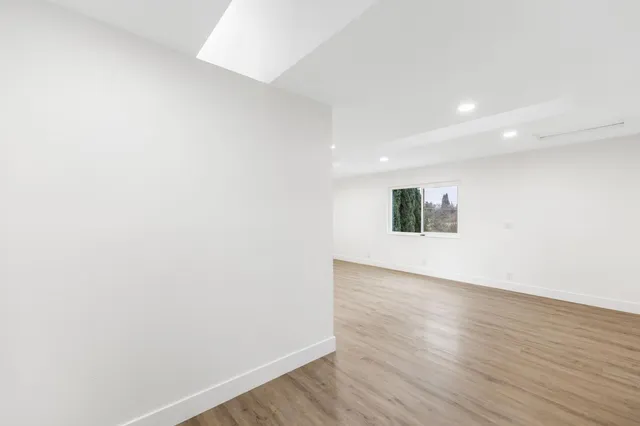 a bathroom with a sink toilet and vanity