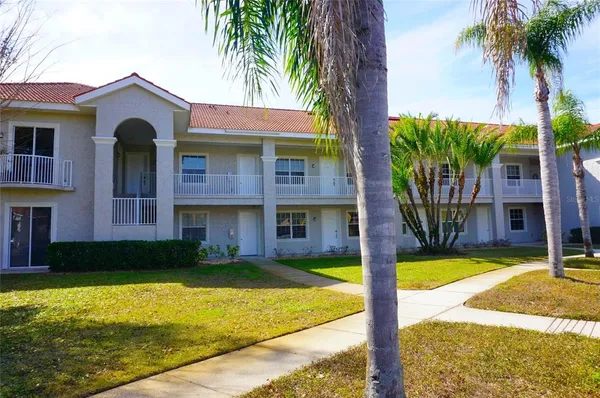 a front view of a house with swimming pool