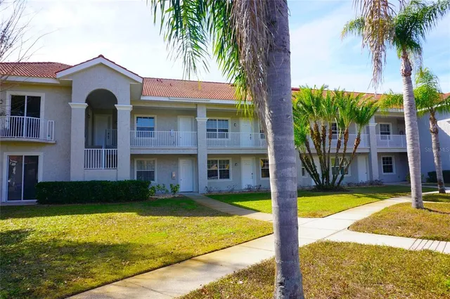 a front view of a house with swimming pool