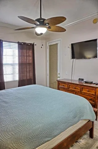 a bathroom with a sink a large mirror and a light fixture