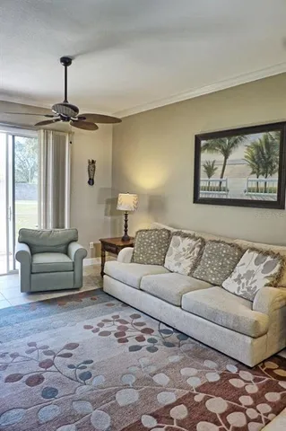 a living room with furniture and a window