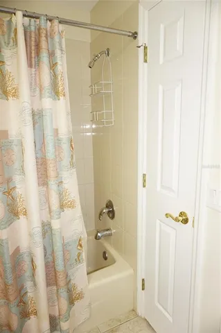 a bathroom with a toilet a sink and a mirror