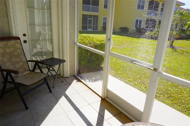 a view of two chairs in the room