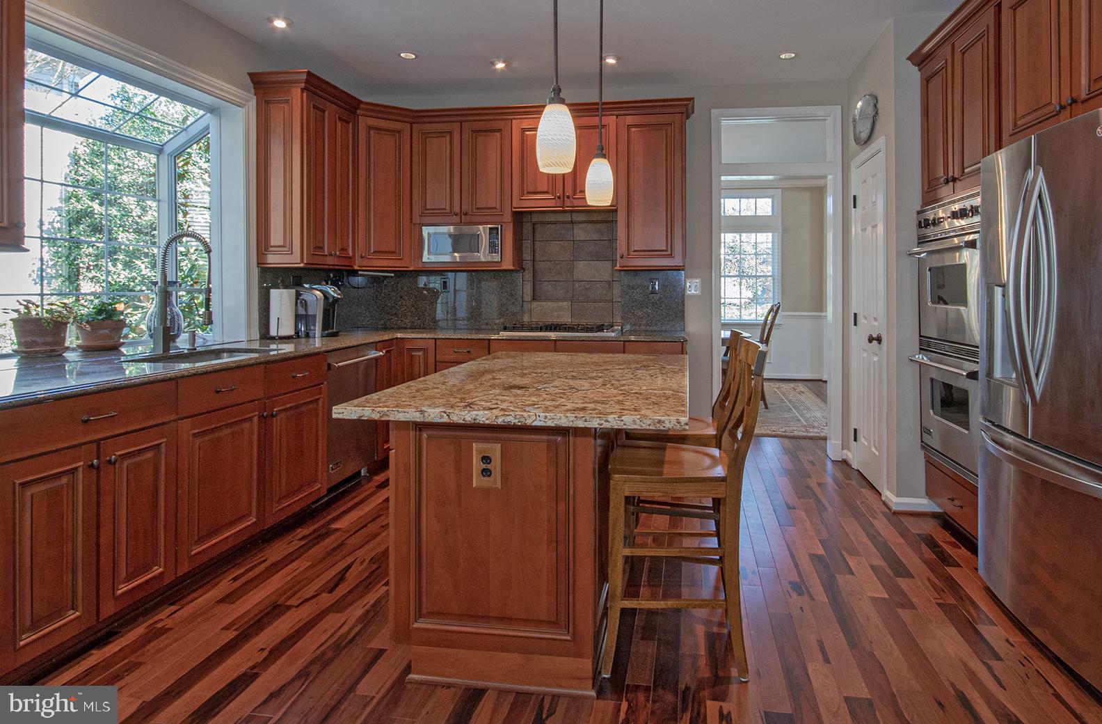 1319 Aldbury Way Reston, VA 20194 - Photo 18 of 78 center island with seating