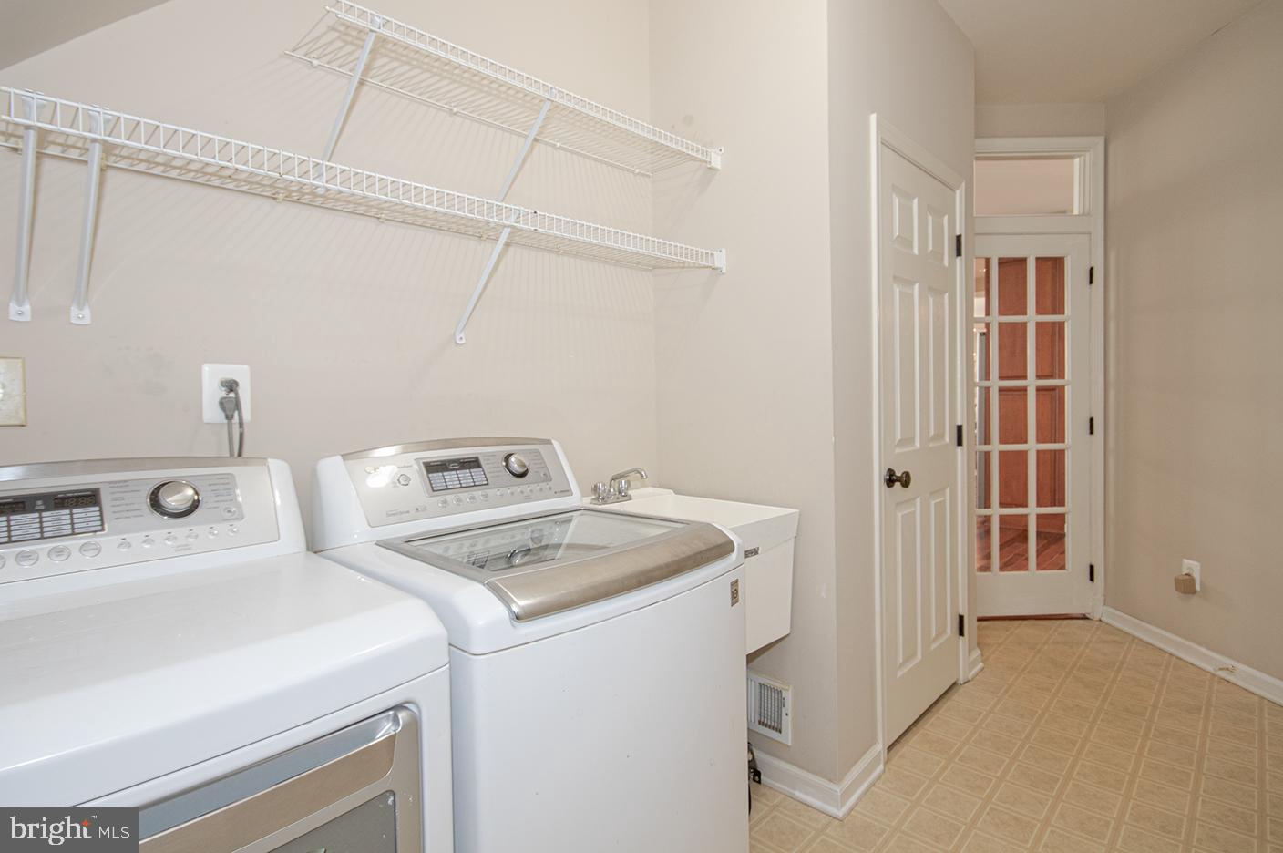 1319 Aldbury Way Reston, VA 20194 - Photo 33 of 78 main floor laundry room off garage and kitchen