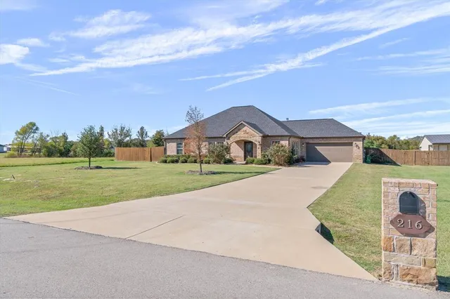 a bathroom with a sink and a garden