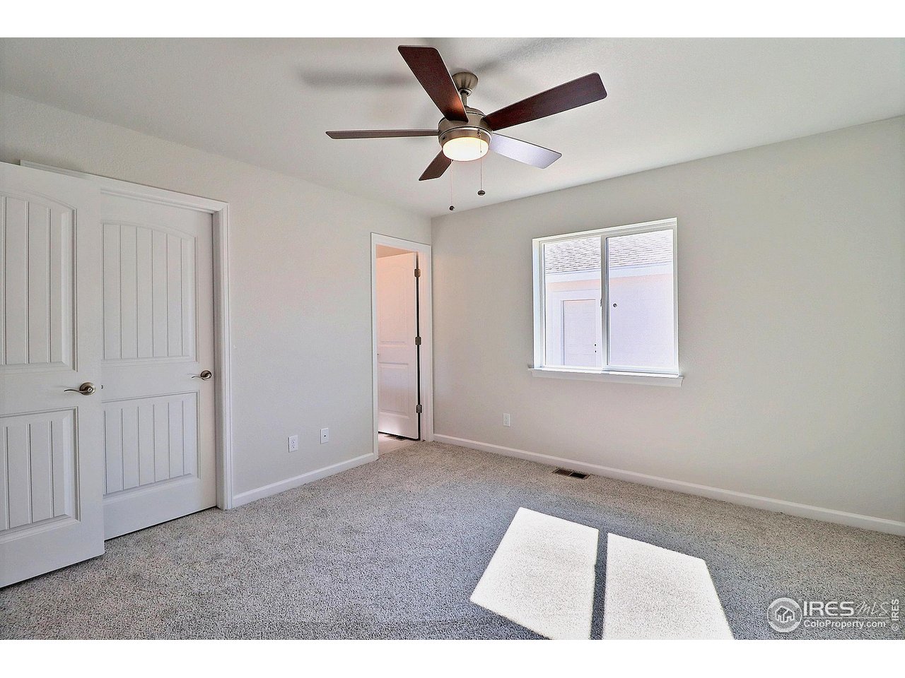 4301 Rockcress Road Evans, CO 80620 - Photo 17 of 26 a view of an empty room