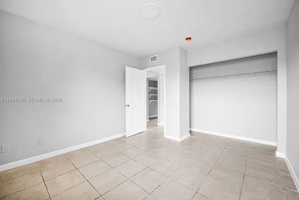 an empty room with window
