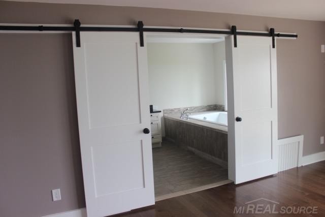 6137 Lakeshore Road Lexington, MI 48450 - Photo 19 of 53 sliding doors to private