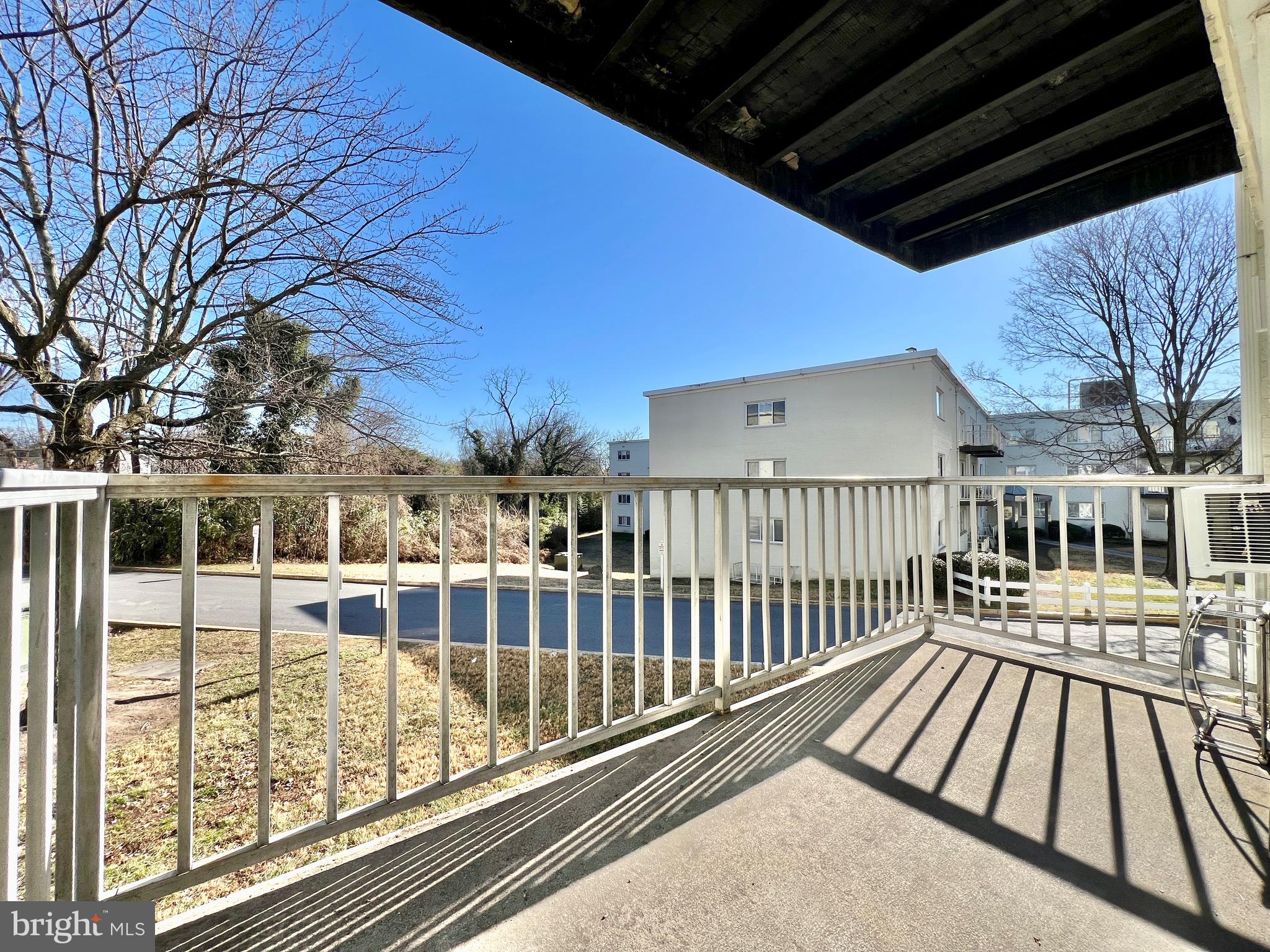 1009 Chillum Road, Unit 202 Hyattsville, MD 20782 - Photo 16 of 19 a view of balcony with wooden floor