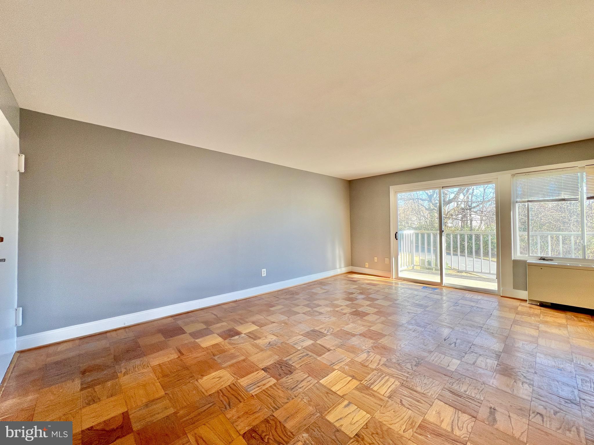 1009 Chillum Road, Unit 202 Hyattsville, MD 20782 - Photo 3 of 19 a view of an empty room with a window