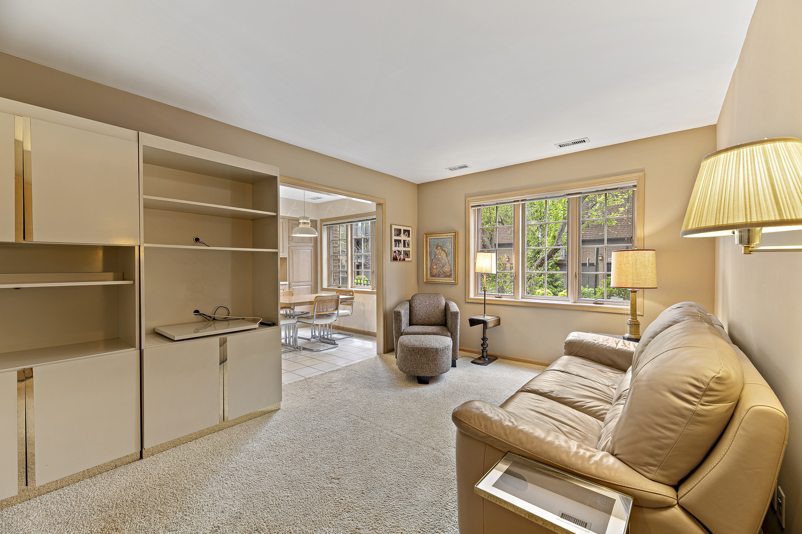 1000 Deerfield Road, Unit 101 Highland Park, IL 60035 - Photo 11 of 19 a living room with furniture a couch and large window
