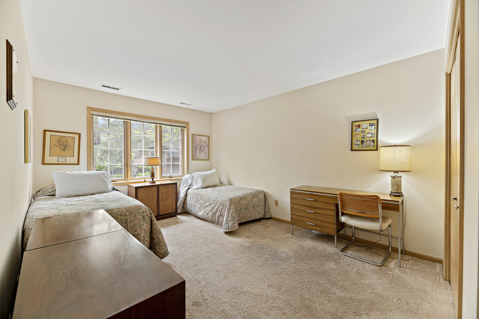 1000 Deerfield Road, Unit 101 Highland Park, IL 60035 - Photo 15 of 19 a bedroom with furniture and a window