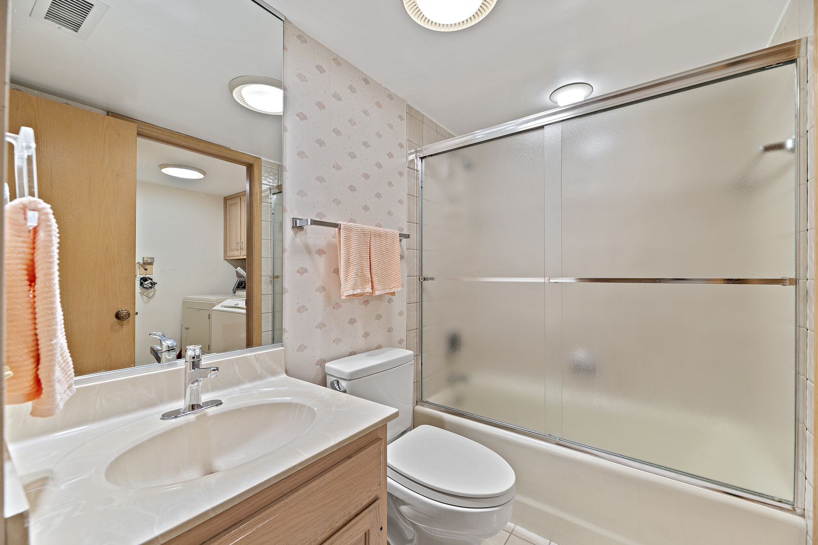 1000 Deerfield Road, Unit 101 Highland Park, IL 60035 - Photo 16 of 19 a bathroom with a sink toilet and shower