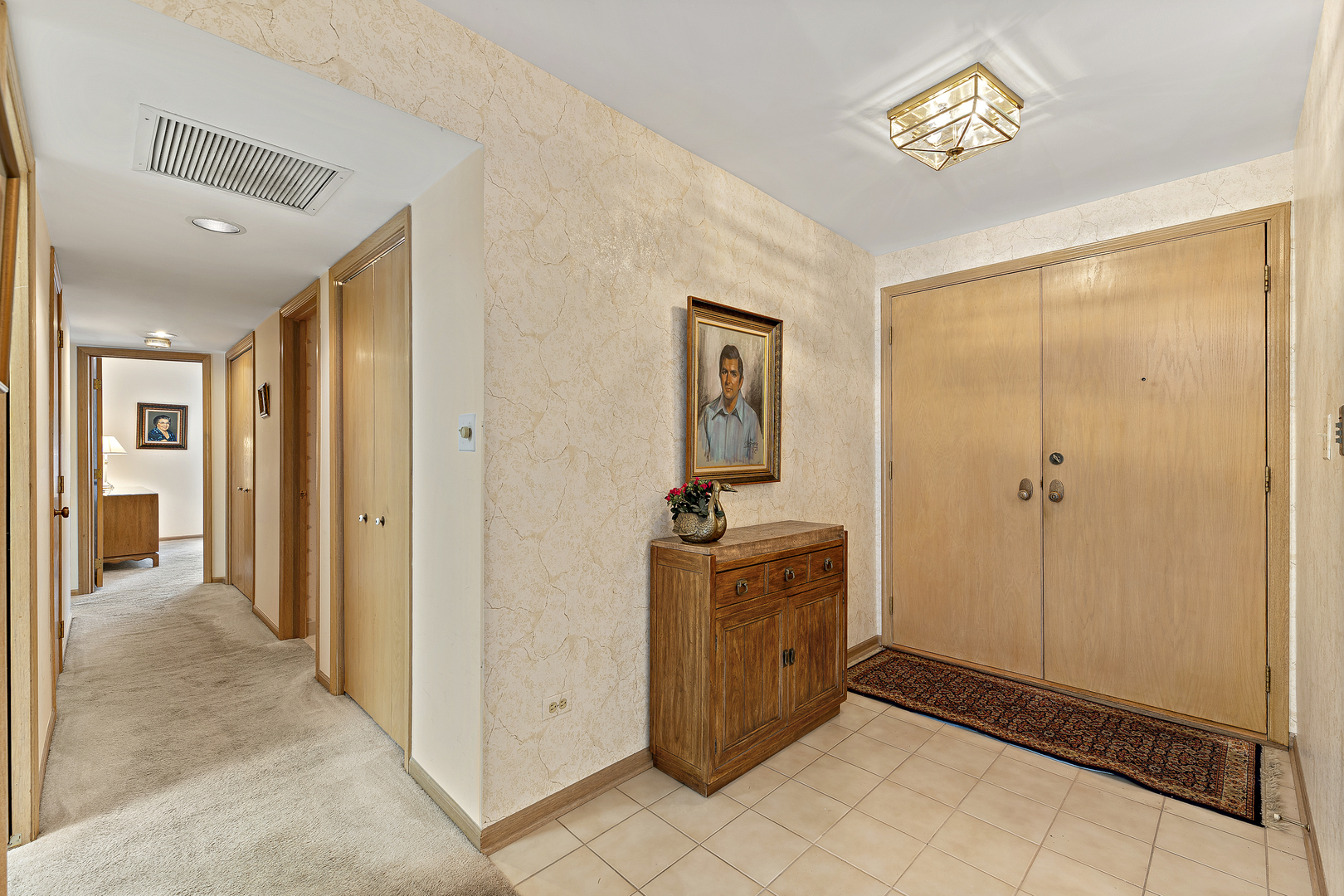 1000 Deerfield Road, Unit 101 Highland Park, IL 60035 - Photo 2 of 19 a view of a hallway with closet area