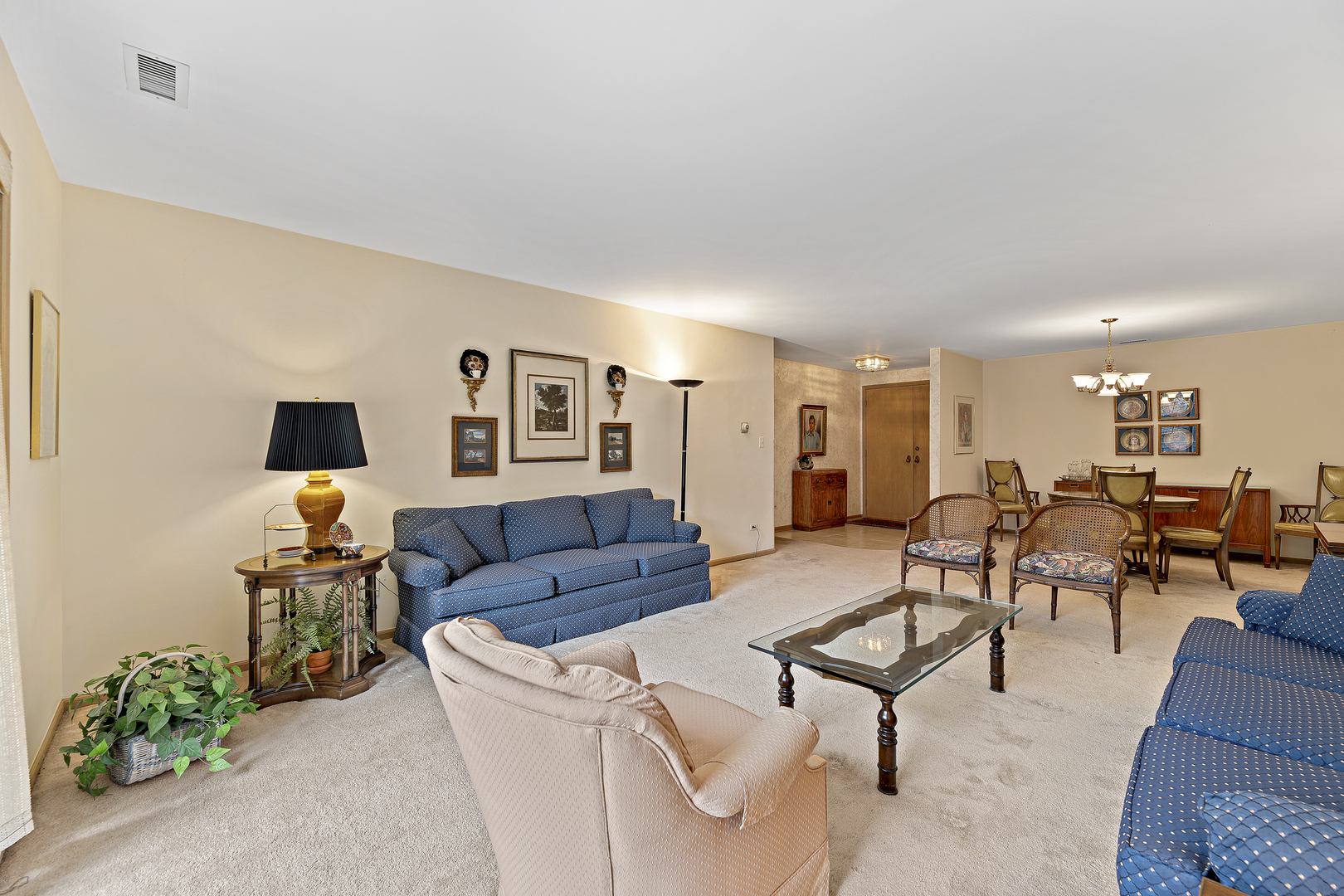 1000 Deerfield Road, Unit 101 Highland Park, IL 60035 - Photo 5 of 19 a living room with furniture and a flat screen tv