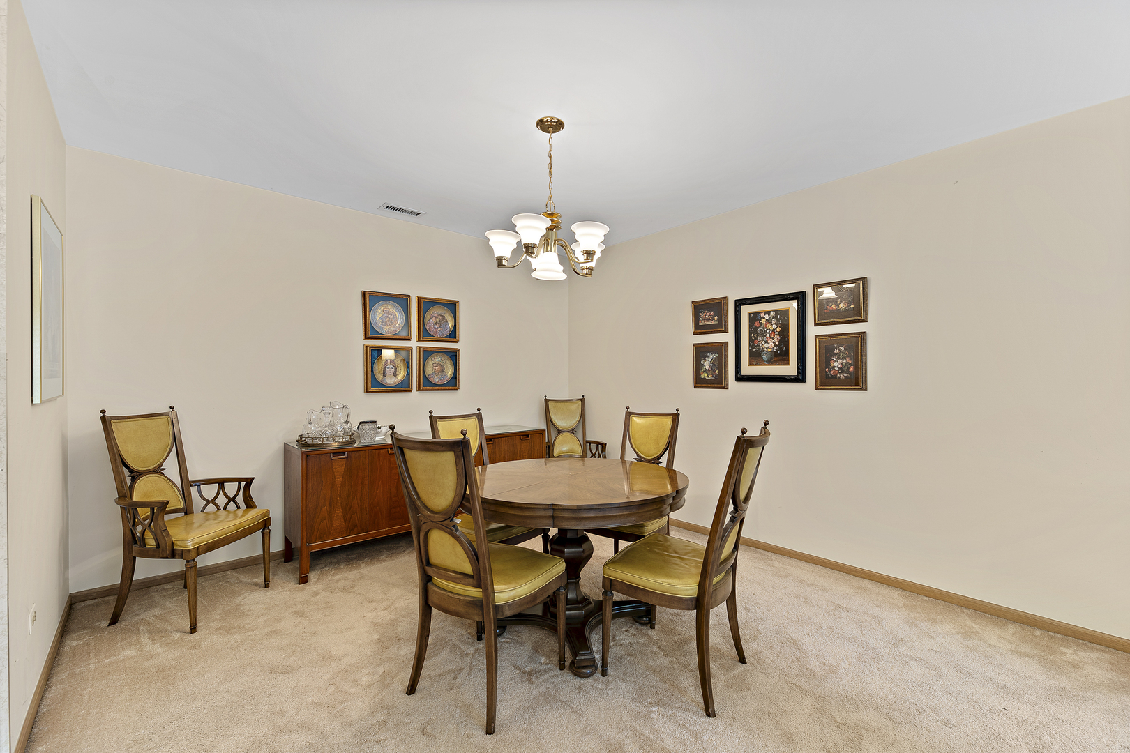 1000 Deerfield Road, Unit 101 Highland Park, IL 60035 - Photo 7 of 19 a view of a dining room with furniture and chandelier