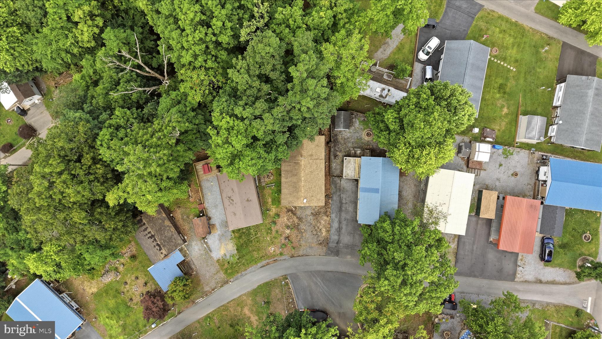 Lot 20 Hot Dog Road Falling Waters, WV 25419 - Photo 25 of 26 an aerial view of a house with swimming pool and garden