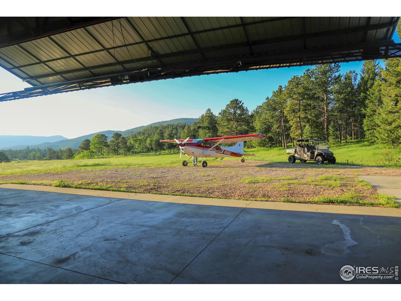 1448 Le Cook Road Allenspark, CO 80510 - Photo 22 of 39 a view of a swimming pool with an outdoor space