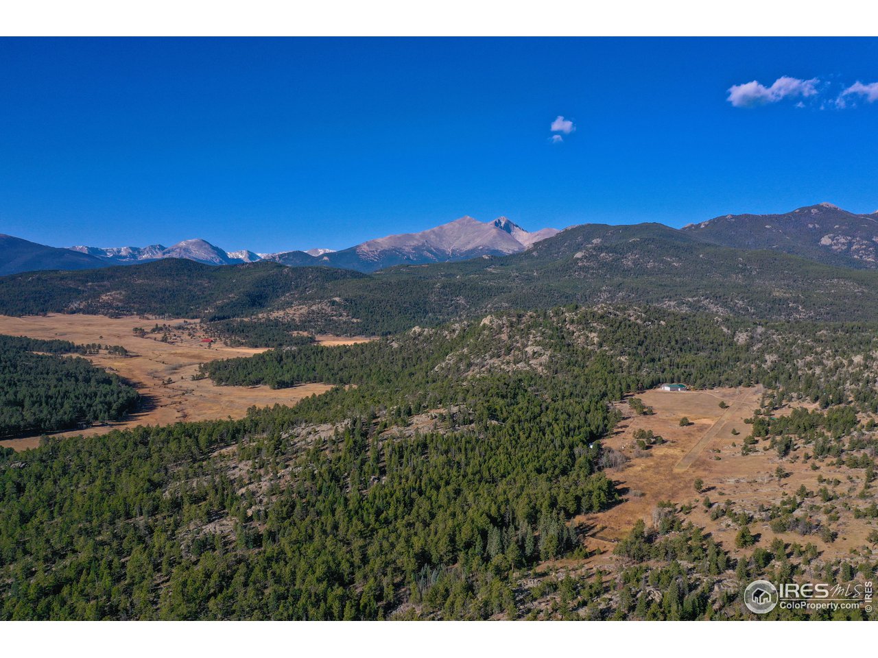 1448 Le Cook Road Allenspark, CO 80510 - Photo 38 of 39 a view of a city with sunset view
