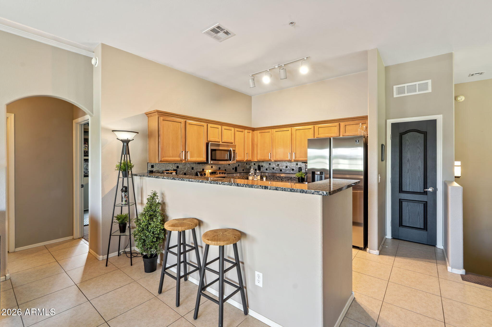 2725 East Mine Creek Road, Unit 2056 Phoenix, AZ 85024 - Photo 14 of 28 Looking back at kitchen