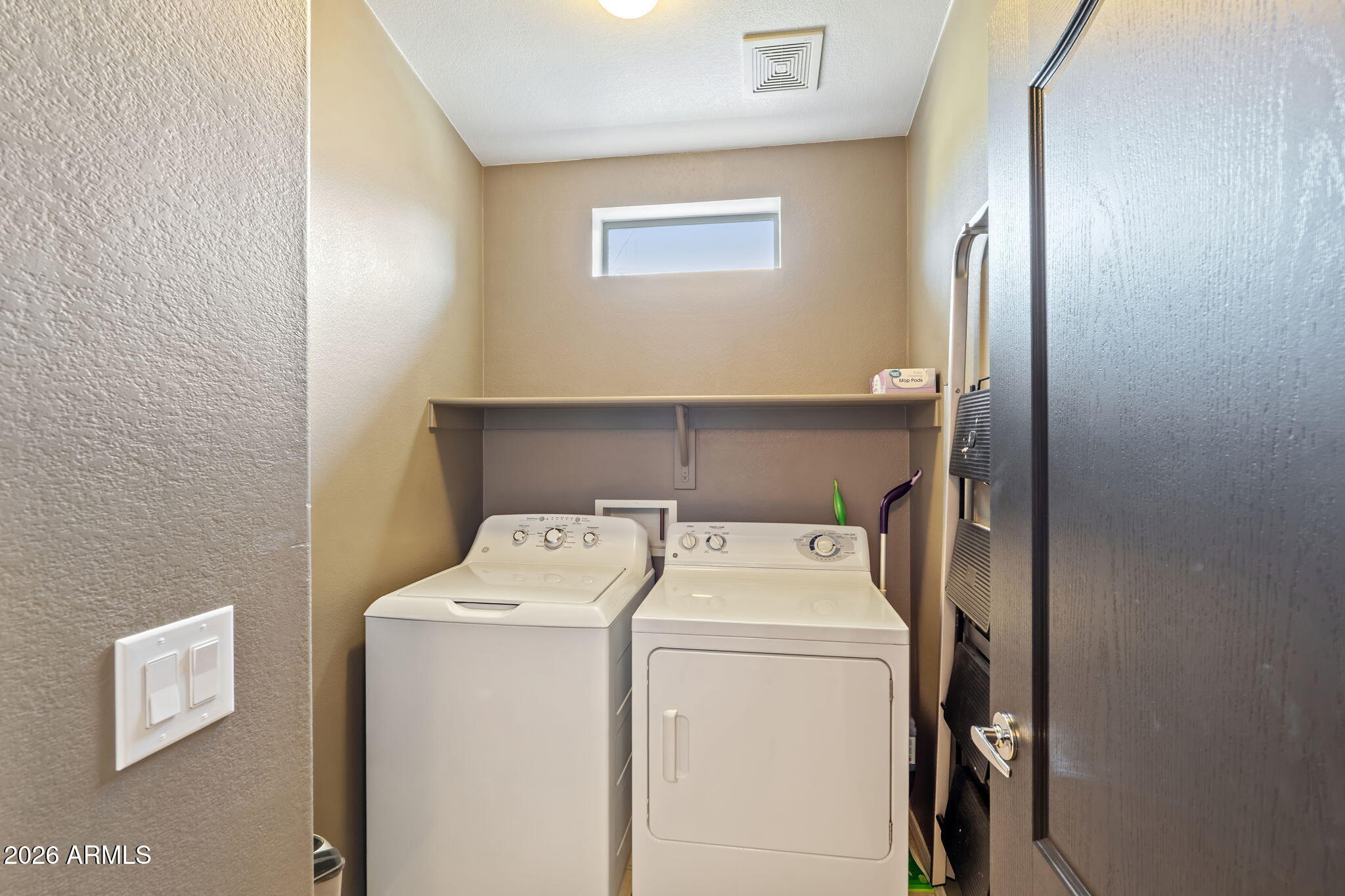 2725 East Mine Creek Road, Unit 2056 Phoenix, AZ 85024 - Photo 26 of 28 Laundry down the hall!