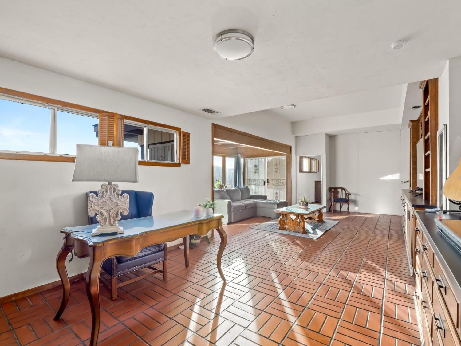 31204 Sierra Drive Exeter, CA 93221 - Photo 25 of 76 a living room with furniture and a flat screen tv