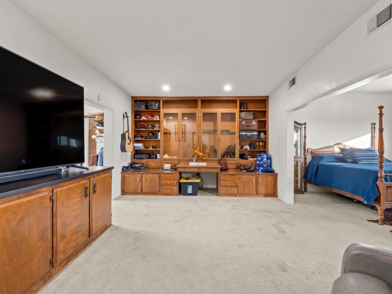 31204 Sierra Drive Exeter, CA 93221 - Photo 30 of 76 a living room with furniture and a flat screen tv