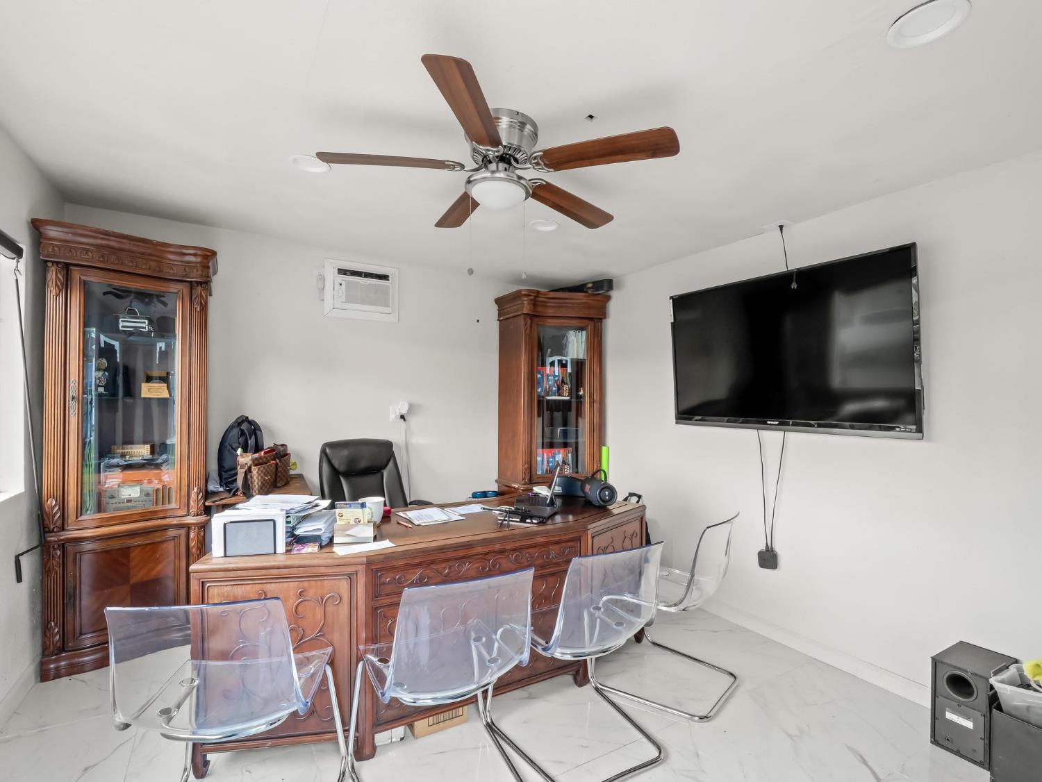 31204 Sierra Drive Exeter, CA 93221 - Photo 47 of 76 a living room with furniture and a flat screen tv