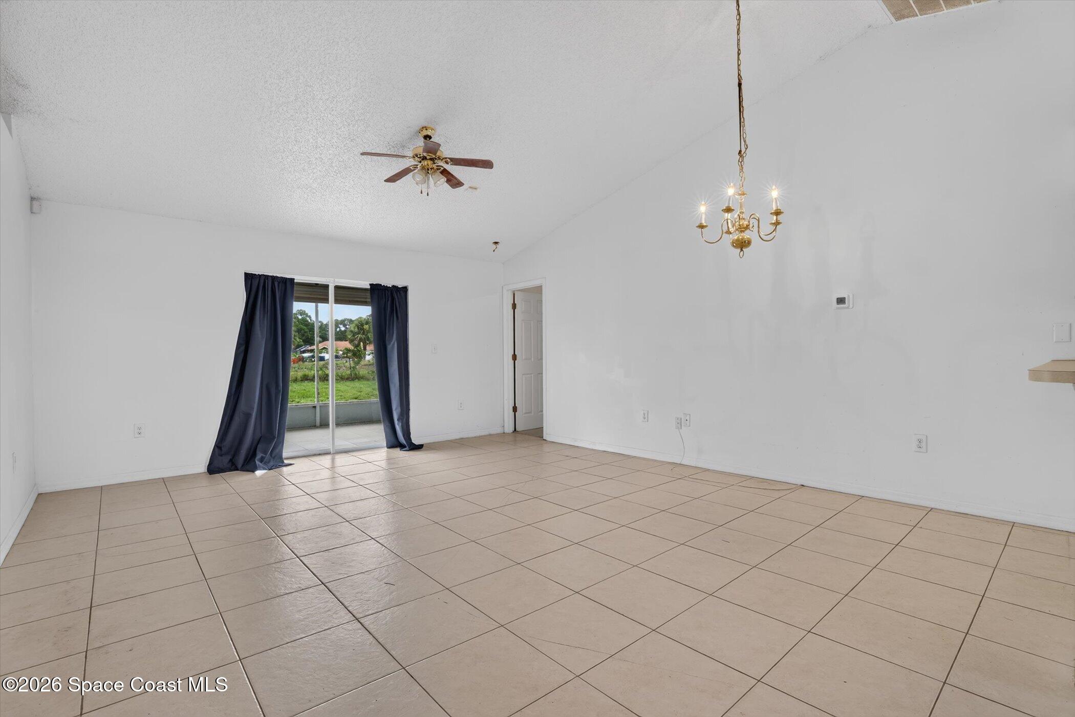 1091 Ray Road Southeast Palm Bay, FL 32909 - Photo 3 of 25 Living Room