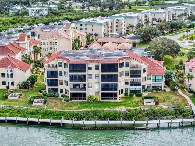 a view of a house with a yard and plants