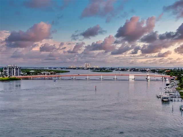 a view of a backyard with sitting area