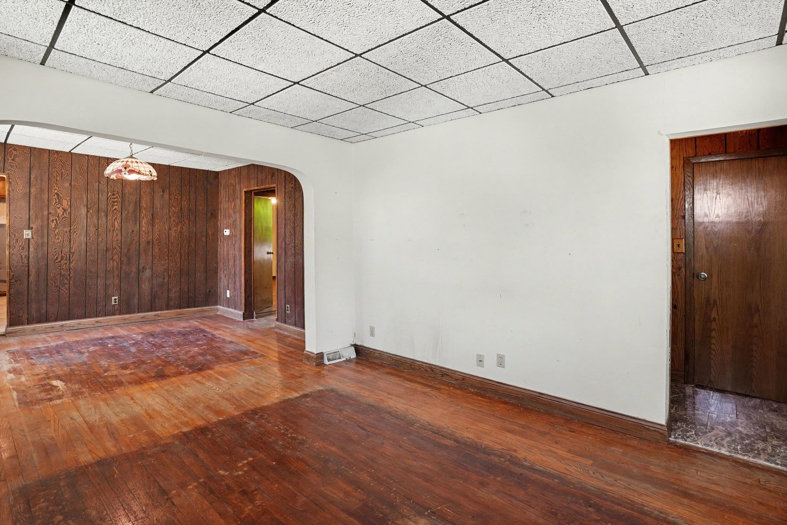 1661 Burr Oak Road Homewood, IL 60430 - Photo 4 of 17 a view of an empty room with wooden floor