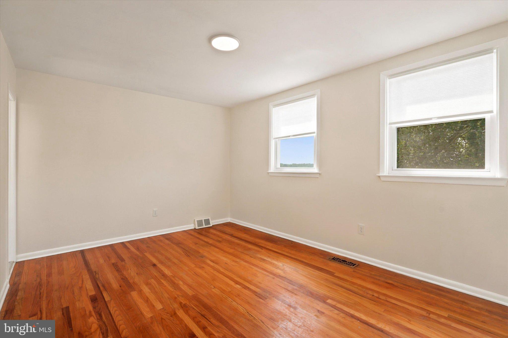 668 Renz Street Philadelphia, PA 19128 - Photo 15 of 25 Bright and airy space with hardwood floors.