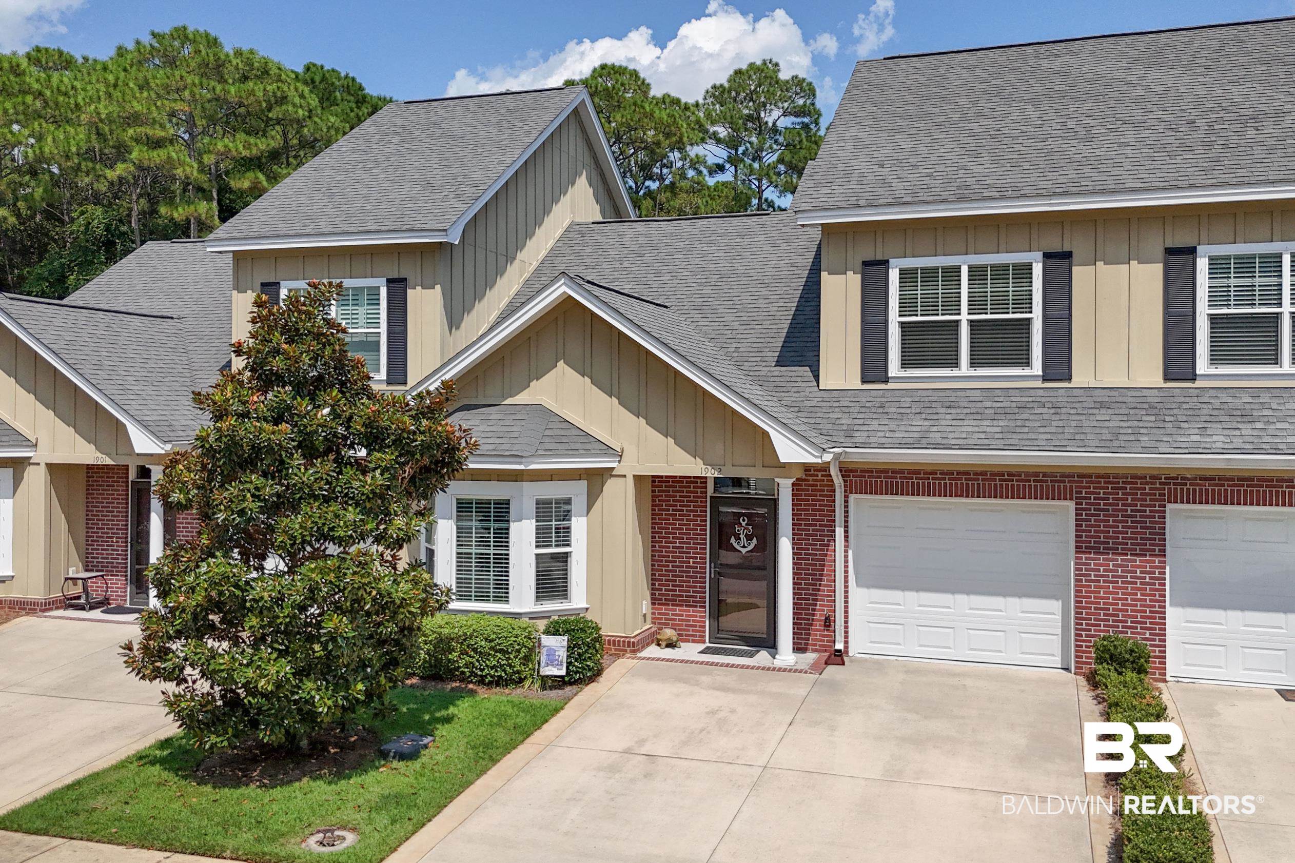 430 West Fort Morgan Road, Unit 1902 Gulf Shores, AL 36542 - Photo 56 of 59 View of front facade with a garage