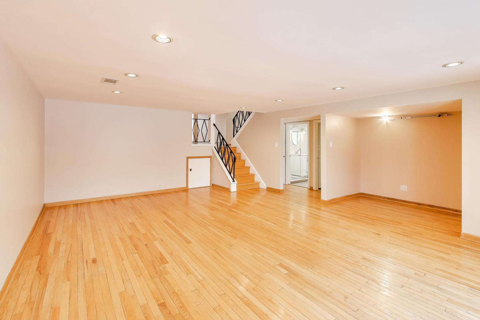 9416 Oliphant Avenue Morton Grove, IL 60053 - Photo 20 of 27 a view of empty room with wooden floor