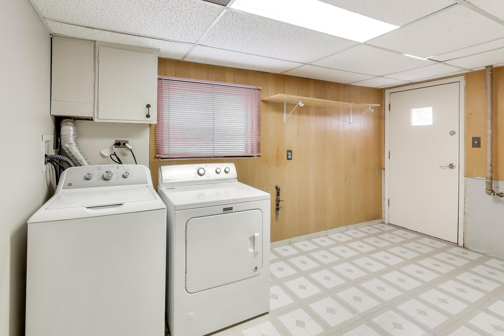 9416 Oliphant Avenue Morton Grove, IL 60053 - Photo 22 of 27 a utility room with dryer and washer