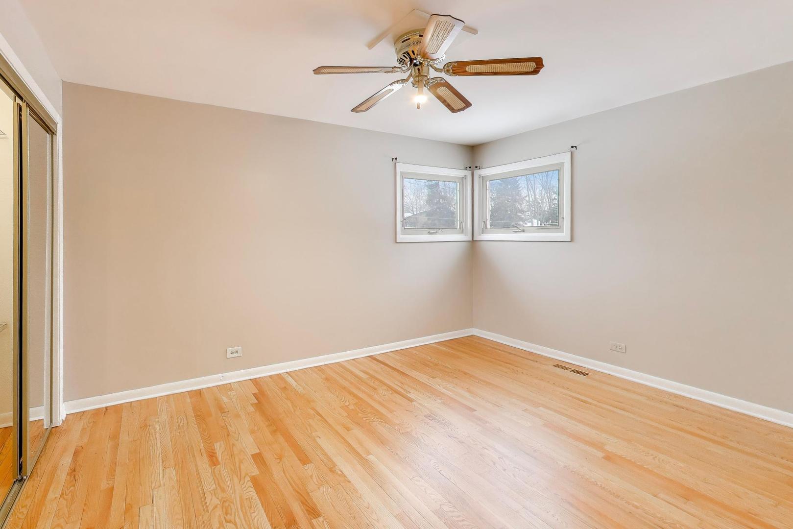 9416 Oliphant Avenue Morton Grove, IL 60053 - Photo 10 of 27 a view of empty room with wooden floor