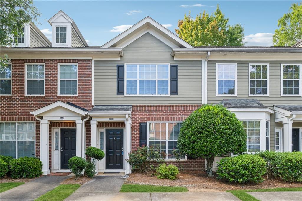 2030 Del Lago Circle, Unit 8 Kennesaw, GA 30152 - Photo 1 of 1 front view of a brick house