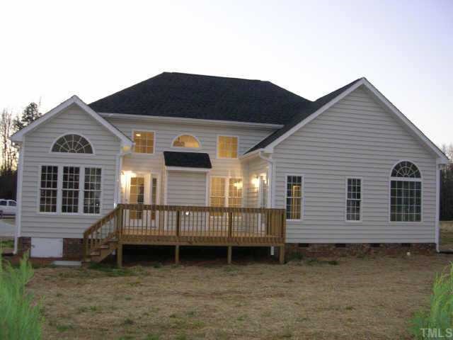 75 Grey Fox Run Road Timberlake, NC 27583 - Photo 3 of 10 Large deck and lots of windows across back