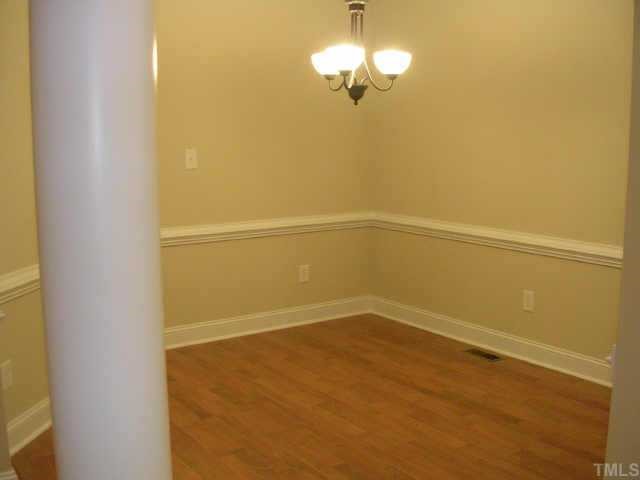 75 Grey Fox Run Road Timberlake, NC 27583 - Photo 5 of 10 Open dining room with column