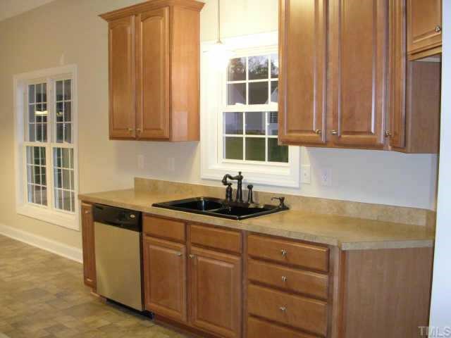 75 Grey Fox Run Road Timberlake, NC 27583 - Photo 6 of 10 Kitchen with upgraded cabinets, countertops and appliances