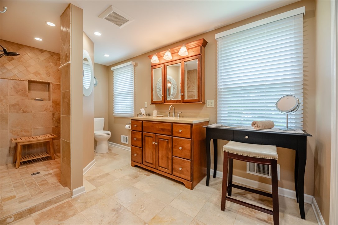 77 Misty Pine Road Perinton, NY 14450 - Photo 27 of 47 THE UPDATED FULL BATH FEATURES A WALK-IN SHOWER, L