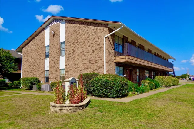 a house view with a garden space
