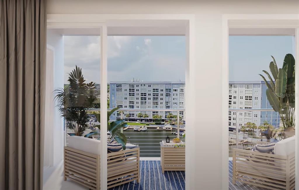 5015 Highway 19, Unit 201 New Port Richey, FL 34652 - Photo 2 of 24 a balcony with a potted plant and outdoor view